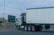 A tractor-trailer approaches the U.S.-Mexico border.