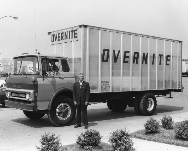 J. Harwood Cochrane and an Overnite GMC truck.