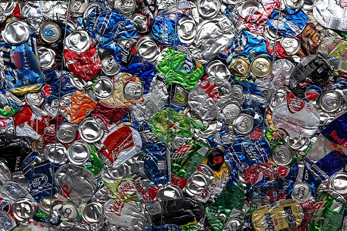 Aluminum - a key dispenser in the modern era. (Photo credit: WikiCommons.) Aluminum cans stacked.
