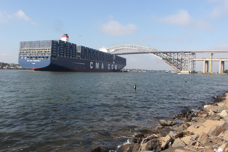 The 14,400-TEU CMA CGM T. Roosevelt approaching the raised, new Bayonne Bridge in New Jersey in September 2017. The bridge was raised to accommodate the new mega-ships being deployed by ocean carriers to accommodate the growth in global trade in the decade ahead. Photo credit: Hugh R. Morley. Bayonne Bridge (new).