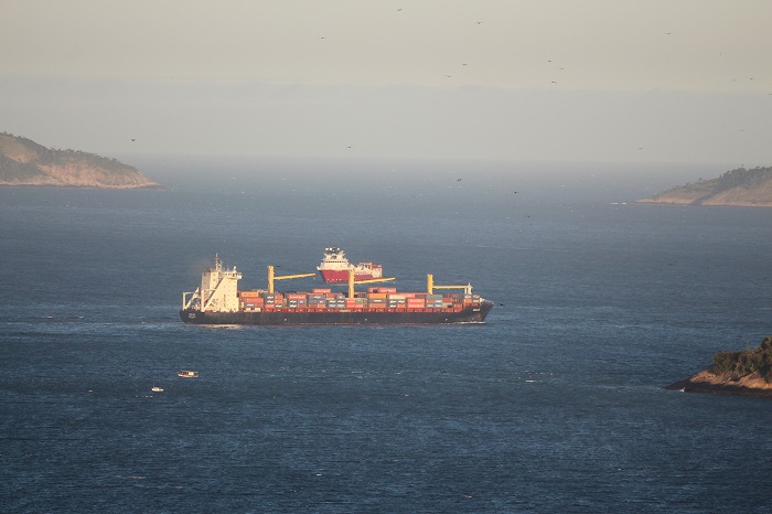 The Temer administration’s deal to end the truckers’ strike included minimum freight rates that some shippers argue favored truckers too much. (Above: A container ship in Guanabara Bay, Brazil.) Photo credit: Shutterstock.com. A container ship in Brazil.