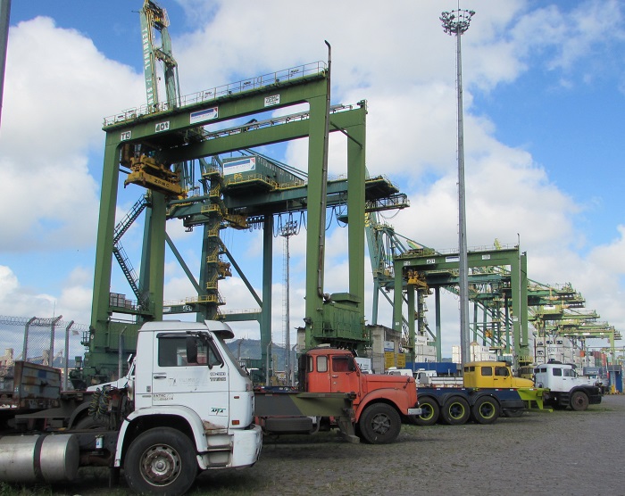 Trucks parked at the Port of Santos, waiting for cargo. A customs officers strike has delayed the transport of container cargo at the port by up to 14 days. Photo credit: Rob Ward. Trucks at the Port of Santos.