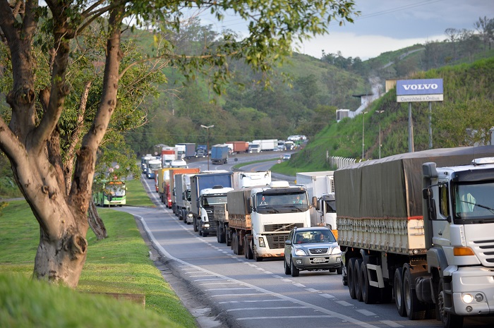 Trucks travel in Brazil. Photo credit: Shutterstock.com. Trucks travel in Brazil.