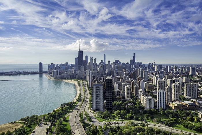 “No one’s coming to save us,” Bobby Harris, president and CEO of BlueGrace Logistics, tells shippers. He’s talking about the tight-capacity, high-priced surface transportation market, which he expects will be with us until late 2019. One BlueGrace solution — it is going to Chicago to hire help. (Above: Chicago, with Lake Michigan.) Photo credit: Shutterstock.com. Chicago with Lake Michigan.