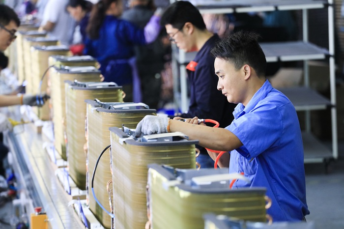 Opponents of tariffs identified the upstream and downstream effects on transportation. (Above: A factory assembly line in China.) Photo credit: Shutterstock.com. An assembly line in China.