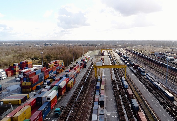 Freight cars at a railyard.