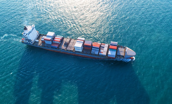 The warning from Singamas is another example of how the tit-for-tat tariffs don’t just expose shipper to immediate higher costs for shipping but also have knock-on effect. Photo credit: Shutterstock.com. A container ship at sea.