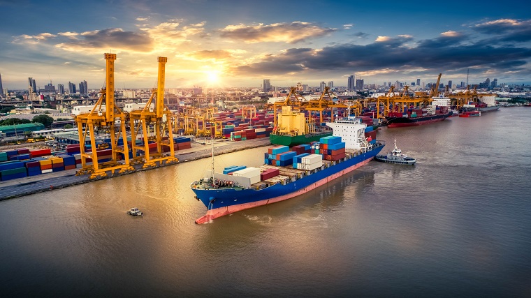 The tech enhancements could have potential benefits for importers in terms of better visibility of their cargo from the vessel discharge process to the out gate process, and for exporters in terms of better gauging the best time to deliver laden boxes to terminals. Photo credit: Shutterstock.com. Container ship at port.