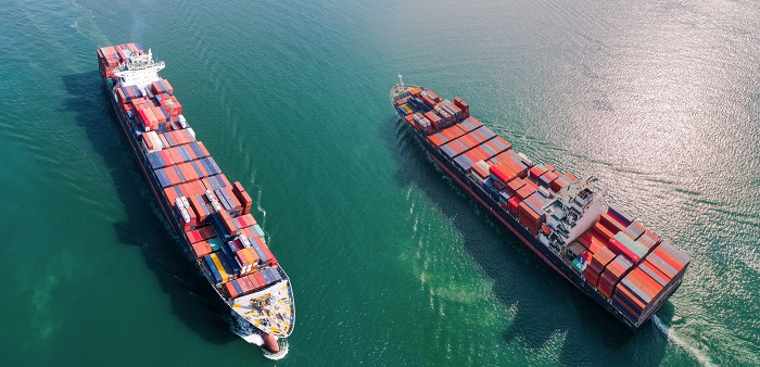 Serious container ship fires are now happening once every 60 days on average, according to the TT Club, a freight insurance and risk-management specialist. Photo credit: Shutterstock.com. Two ships at sea.