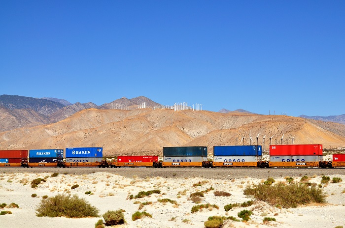 Railroads are no longer taking on new contracts for peak domestic intermodal business later this year out of Southern California. And that means small-size and mid-size shippers will likely be hurt the most because they don’t have the necessary volume to gain leverage in negotiations. (Above: A freight train passed through Palm Springs, California.) Photo credit: Shutterstock.com. Intermodal rail in California.