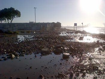 Large waves powered by Hurricane Marie tossed rocks onto the roadway at the Port of Long Beach. Large waves powered by Hurricane Marie tossed rocks onto the roadway at the Port of Long Beach.