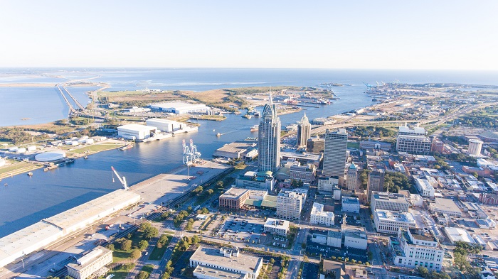 Though the Port of Mobile is a newcomer to automotive traffic, port officials said the port has an advantage with access to Class 1 railroads that connect the port with auto assembly ports in the region and with distribution hubs for import vehicles. Photo credit: Shutterstock.com. Port of Mobile.