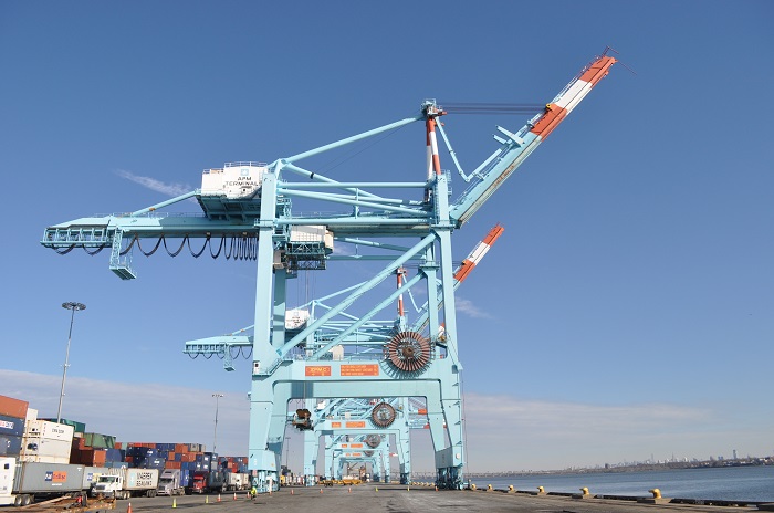 A giant crain awaits a container ship at the Port of New York and New Jersey.