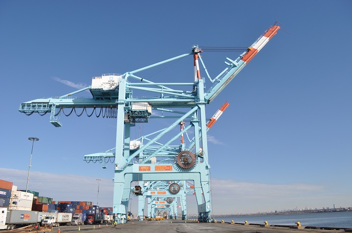 A giant crain awaits a container ship at the Port of New York and New Jersey. Photo credit: Shutterstock.com. A giant crain awaits a container ship at the Port of New York and New Jersey.
