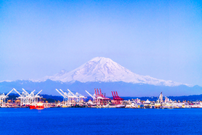 The ILWU on Monday dispatched about 200 longshoremen to Seattle’s Terminal 18 for the night shift, but the dockworkers refused to enter the gate until the office was sanitized. Photo credit: Shutterstock.com