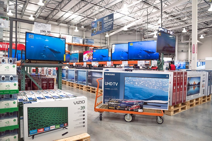 After a robust 2017, another strong year for electronics imports to the US is likely in 2018, given the iPhone/smartphone era and the utility of apps. And only an all-out China/US trade war would slow that trend. (Above: Flat-panel television sets in a United States store.) Photo credit: Shutterstock.com. Flat-panel television sets in a US store.