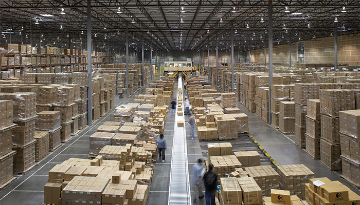 In 2017, the strengthening global economy increased both business volumes and freight rates — boosting Top 50 third party logistics providers’ revenue, while fueling niche mergers and acquisitions. Photo credit: Kuehne & Nagel. A warehouse.