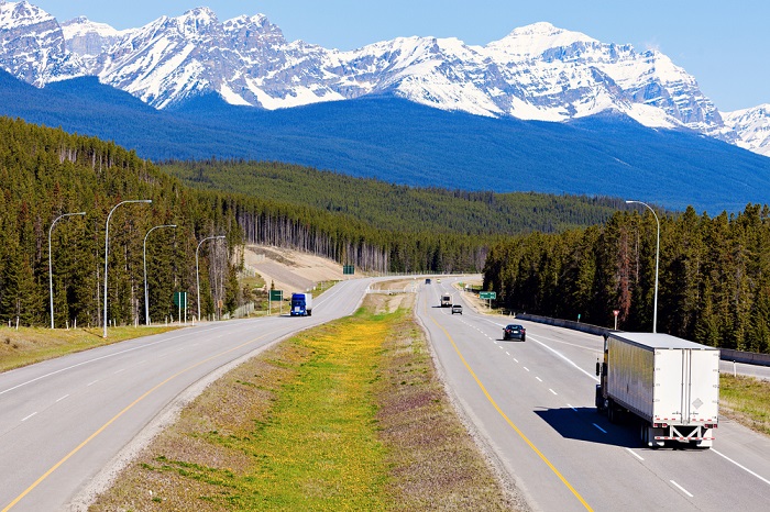Canada's ELD is expected to further tighten Canadian trucking capacity, which is already hit by an aging workforce. Photo credit: Shutterstock.com. A truck travels in Canada.