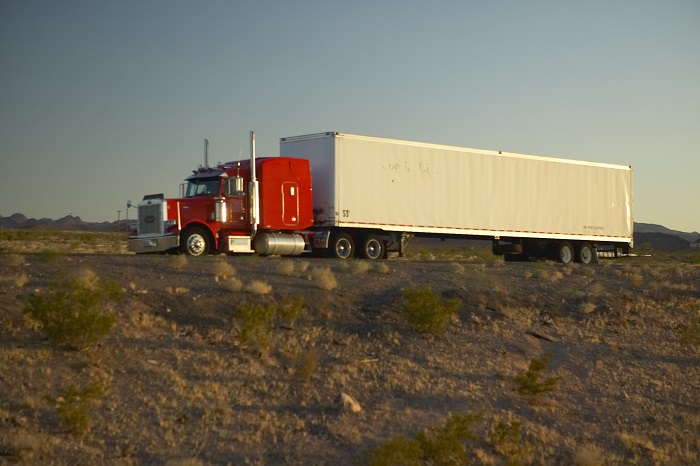 A truck travels on a US road. Photo credit: Shutterstock.com. A truck travels on a US road.
