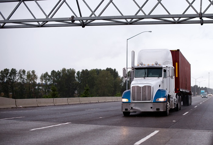 The number of hours truckers may drive is getting more attention from Congress, but do bills calling for reform, or the overturn of the ELD mandate, stand a chance this year? Photo credit: Shutterstock.com. A truck travels on a US highway.