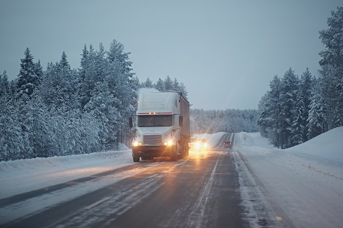 A truck travels on US road. Photo credit: Shutterstock.com. A truck travels on a US road.