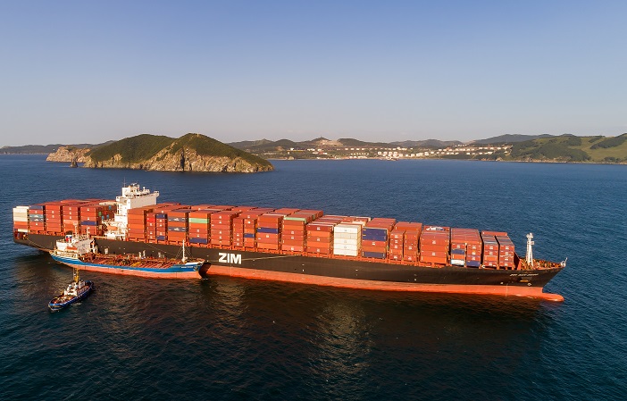 The reduction of capacity of about 2,600 TEU weekly through the revised services, from six to five strings and launching Sept. 12, is less than anticipated, with ships on four of the five loops having average vessel capacity of more than 8,000 TEU. Photo credit: Shutterstock.com. A ZIM container ship.