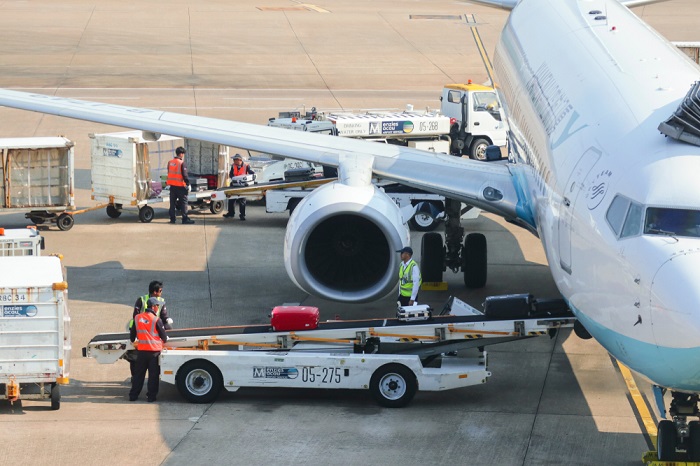 Caught up in the wide net cast by the tariffs were electronics and other higher-value consumer products traditionally shipped by air, and after ignoring the trade war for months there was 4.5 percent increase in China-US demand in October. (Above: Air cargo being loaded in China.) Photo credit: Shutterstock.com. Air cargo being loaded in China.