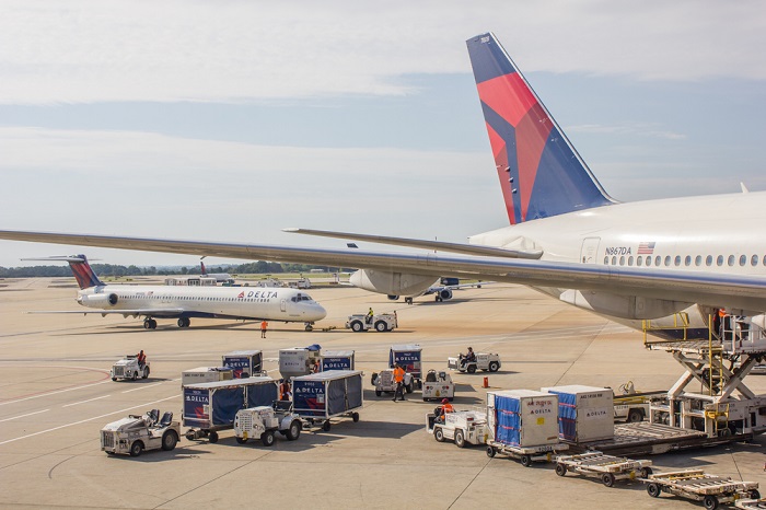 At Hartsfield-Jackson Atlanta International Airport, the world’s busiest passenger and 42nd busiest cargo airport, congestion and delays in picking up/dropping off loads are adding wait time surcharges, and in some cases storage expenses, on to already high transport bills. (Air cargo being processed in Atlanta.) Photo credit: Shutterstock.com. Air cargo at Hartsfield-Jackson Atlanta International Airport.