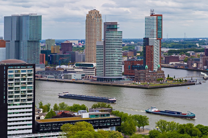 Executives from Imperial Logistics International participated in a wide-ranging question and answer session concerning the mounting intermodal transport challenges facing shippers and forwarders moving cargo around Europe. (Above: Barges travel near the Rotterdam port.) Photo credit: Shutterstock.com. Barges travel near the Rotterdam port.