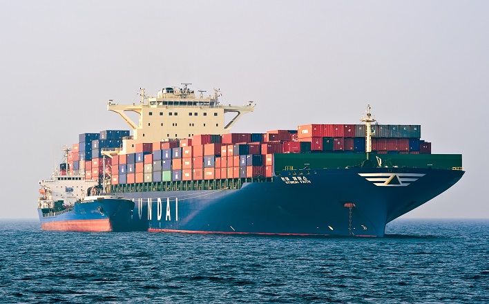The unveiling of new bunker fuel adjustment factors (BAFs) from three of the largest global container lines over the last week has focused the industry’s attention to billions of dollars of extra cost hitting an already volatile industry. (Above: A container ship during refueling.) Photo credit: Shutterstock.com. A container ship during refueling.
