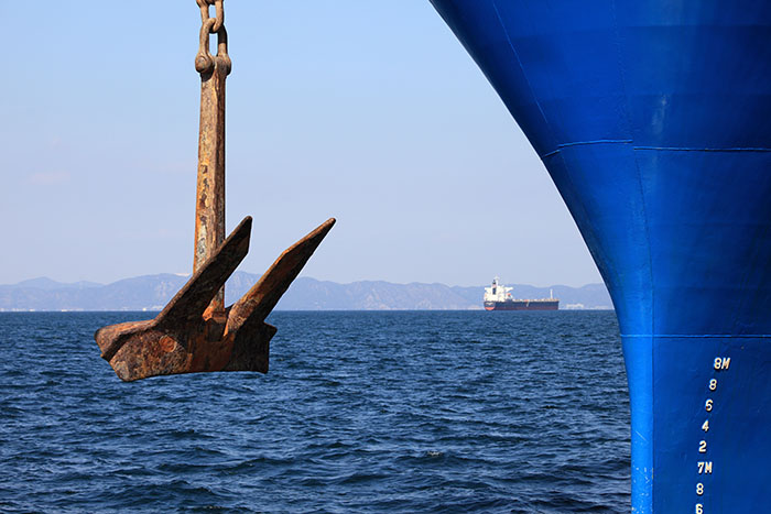 Container ships have had their anchors in the water outside of some Asian ports so long its disrupting sailing schedules. Photo credit: Shutterstock.com.