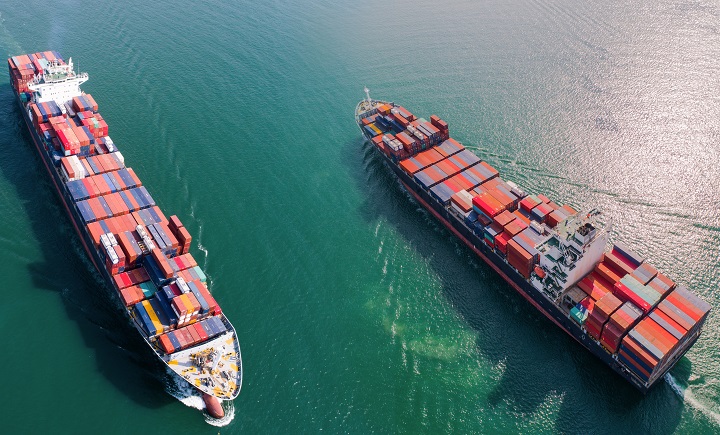 The World Shipping Council (WSC), which represents the container shipping industry, said the paper by the OECD’s International Transport Forum (ITF) that wants the European Commission’s (EC) block exemption for container shipping lines to end without renewal in April 2020 demonstrated “a fundamental misunderstanding” of how the consortia block exemption works. Photo credit: Shutterstock.com. Two container ships at sea.