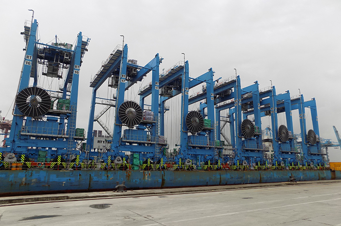 The new cranes are electric and will help reduce harmful emissions from the port.