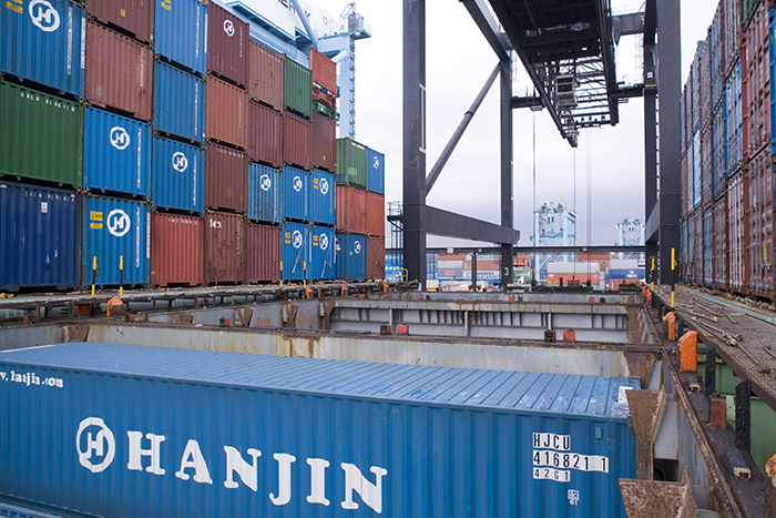 While Korean Air Lines has approved the deal, a complex exhange of shares in a Long Beach container terminal remains an issue.
