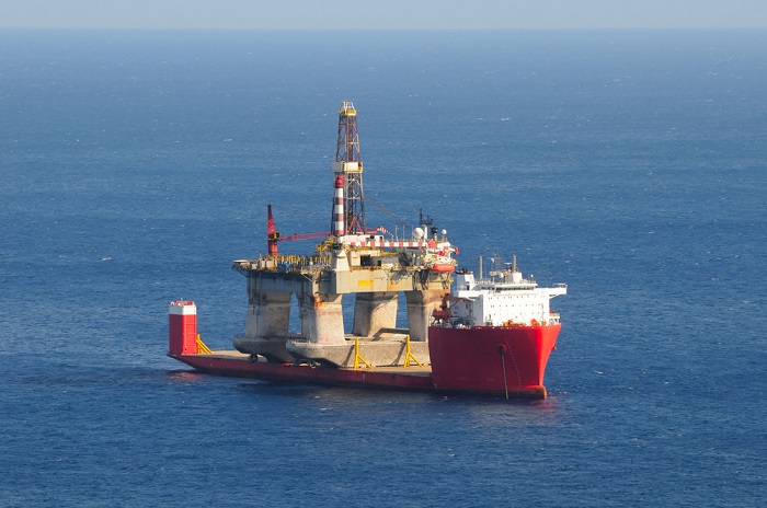 The carriage ban makes it an offense for ships to carry fuel with sulfur content higher than 0.5 percent, unless the vessel has a scrubber. Photo credit: Shutterstock.com. A heavy lift ship.