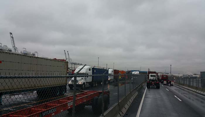 New York-New Jersey harbor truckers hope the new system will provide the information needed to make improvements that will help long truck lines such as the one pictured.