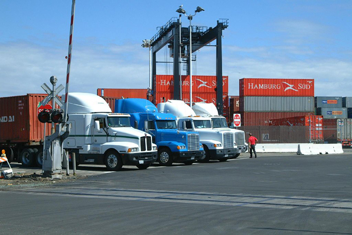 Truckers at the Port of Oakland, pictured, are still adapting to the port's new appointment system, a practice some observers say will spread throughout the rest of the U.S. port sector.