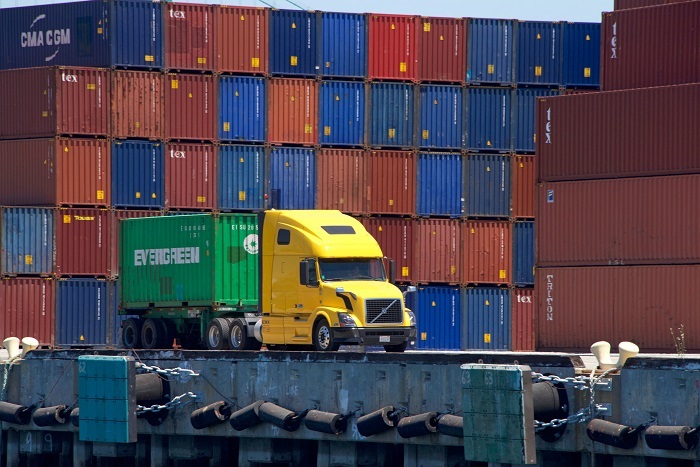 A fee of $63.04 per FEU will not discourage nighttime calls: “You show up to get the container when you can get the container,” a key trucking official said. Photo credit: Shutterstock.com. A truck with cargo at the Port of Los Angeles.