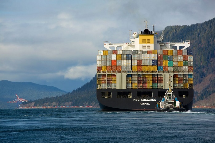 The British Columbia Maritime Employers Association (BCMEA) and the ILWU Canada locals have been negotiating since February on a new agreement to replace the eight-year contract that was set to expire on March 31. (Above: A container ship approaches the Port of Prince Rupert, Canada.) Photo credit: Shutterstock.com. Port of Prince Rupert.