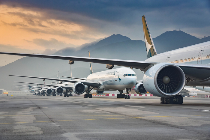 Cathay Pacific planes parked at Hong Kong International Airport. The carrier will operate just 3.5 percent of its 152-aircraft capacity in June, and 9.4 percent in July. Photo credit: Shutterstock