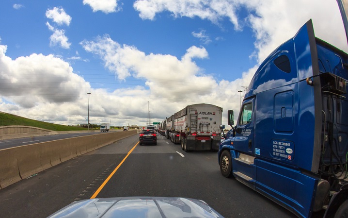 Trucks travel on a highway in near Toronto, Canada.