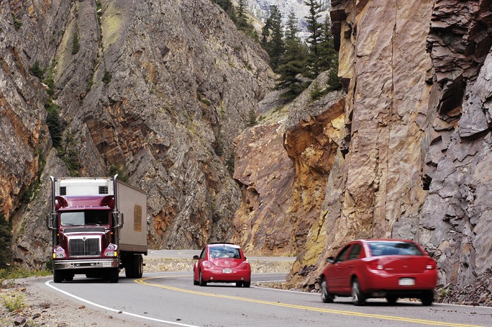 Machine learning tools are often touted as mechanisms to drive next-level benefits in freight movement, but current use cases are more feet-on-the-ground than head-in-the-cloud applications. Photo credit: Shutterstock.com. A truck travels on a US road.