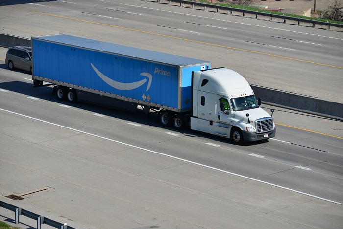 One can make an argument that the US truck sector has reached its peak, but others argue with a robust manufacturing sector and other sources of growth, another year of strong year-over-years truck sector is ahead. Photo credit: Shutterstock.com. A truck travels on a US highway.