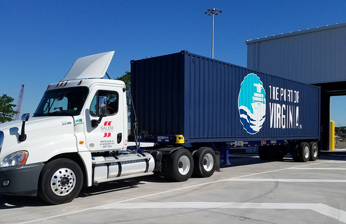 The first truck passes through the Port of Virginia's new gates during the christening ceremony.