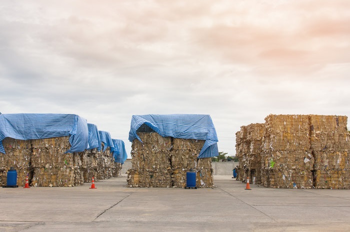 “Paper is looking for new homes, but you can’t replace a market the size of China,” said Nick Halper, director of exports at the Paper Tigers, which is seeking to retain market share by shipping high-quality wastepaper to China. “What we ship is clean enough to go there.” Photo credit: Shutterstock.com. Wastepaper stacked.
