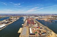 The International Longshoremen's Association and New York Shipping Association accuse the commission of overstepping its authority to combat crime on the docks, and say the commissionâs effort to oversee hiring in the port causes delays and disruption. The Waterfront Commission says its work is necessary, and it is merely carrying out its responsibility to fight racketeering and ensure fair hiring, in part by promoting diversity. (Above: The Port of New York and New Jersey.) Photo credit: Shutterstock.com. Port of New York and New Jersey Bayonne.