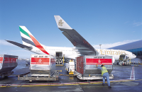 Air cargo being loaded on an Emirates plane.