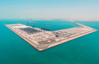 Khalifa Port, pictured, will be able to handle 15 million 20-foot-equivalent units annually when complete.