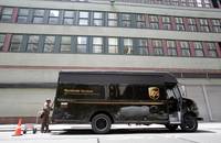 Above: A UPS truck and professional during delivery operations in New York City, United States. Photo credit: Shutterstock.com. A UPS truck in New York City, New York, United States.
