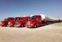 Lone Star Transportation trucks hauling wind turbine parts.